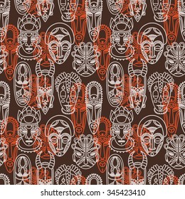 seamless pattern with tribal african masks, vector illustration