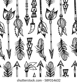 Seamless pattern with tribal arrows and feathers. Hand drawn vector illustration. Indian vintage tribal background for prints, textile, T-shirt.