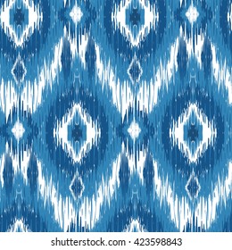 Seamless pattern Tribal Art  Ikat Ogee in traditional classic blue and white colors. Boho style.