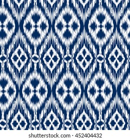 Seamless pattern Tribal Art Ikat Ogee in traditional classic blue and white colors. Boho style.