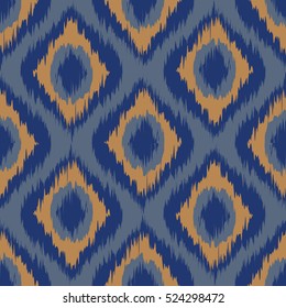 seamless pattern Tribal Art Ikat Ogee in traditional classic blue and orange colors vector art