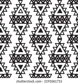Seamless pattern with tribal aztec motives. Black and white abstract wallpaper in boho style with hand drawn elements. 