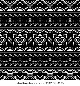 Patrón sin foco con motivos tribales aztecos. Papel de pared abstracto en blanco y negro en estilo boho con elementos dibujados a mano. 