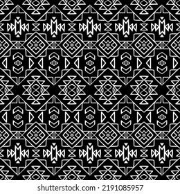 Seamless pattern with tribal aztec motives. Black and white abstract wallpaper in boho style with hand drawn elements. 
