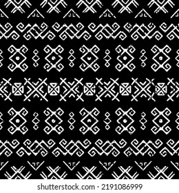 Patrón sin foco con motivos tribales aztecos. Papel de pared abstracto en blanco y negro en estilo boho con elementos dibujados a mano. 