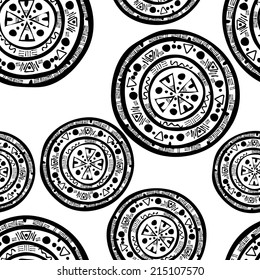 Seamless pattern with tribal coins