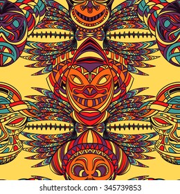 Seamless pattern with tribal mask and aztec geometric latin American ornament. Hand drawn vector illustration