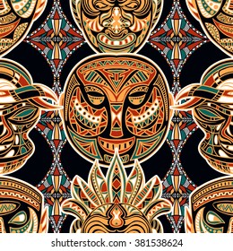 Seamless pattern with tribal mask and aztec geometric latin American ornament. Colorful hand drawn vector illustration