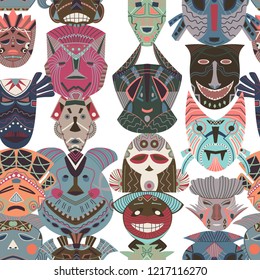 Seamless pattern with tribal masks. African ethnic background with geometric elements. Vector illustration