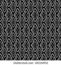 Seamless pattern tribal rhombuses-vector illustration. Black and white print touches the line.