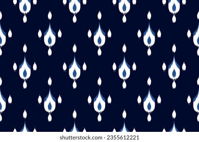 Seamless pattern in tribal,folk embroidery. Ethnic abstract ikat art. geometric art ornament print. Design for fabric,clothing,carpet,wallpaper,wrapping,cover,background