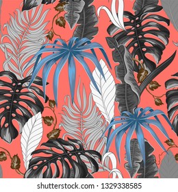 Seamless pattern with tropical banana, palm and monstera leaves for fabric design on living coral background