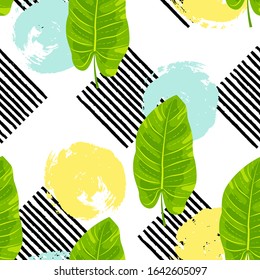 Seamless pattern with tropical exotic leaf, hand drawn stripes and round spots . Vector illustration.