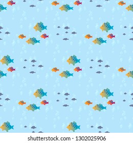 Seamless pattern with tropical fish on a blue background