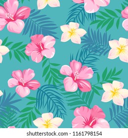 seamless pattern with tropical flowers and leaves