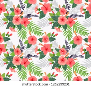 Seamless pattern with tropical flowers and leaves. Hibiscus flowers. Bright jungle pattern with palm leaves and exotic plants. Elegant template with Hawaiian motifs on a white background.