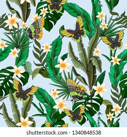 Seamless pattern with tropical leaf, flowers and butterfly for fabric design.