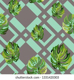 Seamless pattern with tropical leaves.