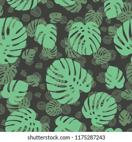 Seamless pattern with tropical leaves. Abstract modern monochrome green background. Vector illustration.
