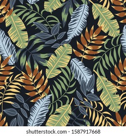 Seamless pattern with tropical leaves and bright colors on black background. Print of the jungle. Vector design. On a floral background. Textiles and printing. Exotic, tropical.
