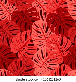 Seamless pattern with tropical leaves in coral colors.