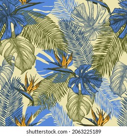 Seamless pattern with tropical leaves and exotic Strelitzia flowers. Bird of Paradise flowers. Monstera and palm leaves. Hand drawn vector background.