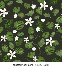 Seamless pattern. Tropical leaves and flowers. Summer  template for poster, banner, postcard. Green leaves on dark background.