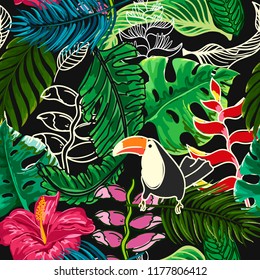 Seamless pattern of tropical leaves and flowers with cute toucan.