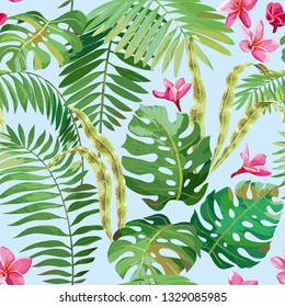 Seamless pattern of tropical leaves and flowers of plumeria on a light blue background.
