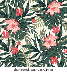 Seamless pattern with tropical leaves and flowers. Exotic wallpaper, Hawaiian style. Jungle leaves vector floral pattern background. Botanical pattern. Trendy hand drawn textures.