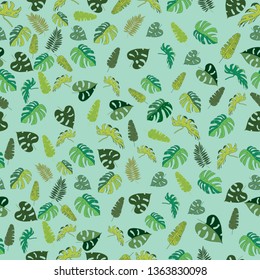 Seamless pattern of tropical leaves. Made in green with large leaves, with a green background. The pattern can be used for printing, as a background, as a texture.