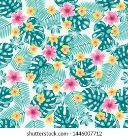 Seamless pattern with a tropical leaves of monstera and Areca trees and hibiscus flowers.