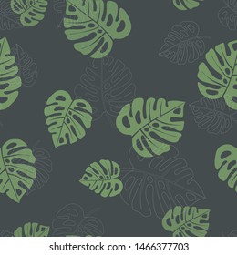 Seamless pattern with tropical leaves of monstera on black background.