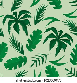 Seamless pattern with tropical leaves on green background
