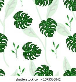 seamless pattern of tropical leaves on a white background for textiles.