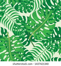 Seamless pattern with tropical leaves on a green background.