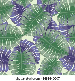Seamless pattern with tropical leaves on a green background.