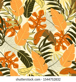 Seamless pattern with tropical leaves on a light background. Floral seamless vector tropical pattern background with exotic leaves, jungle leaf. Vector background for various surface. 