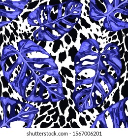 Seamless pattern with tropical leaves on cheetah spots. Beautiful allover print with hand drawn exotic plants. Summer nature jungle print. Can be used for any kind of a surface design. Vector.