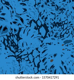 Seamless pattern with tropical leaves on cheetah spots. Hand drawn exotic plants. Summer nature jungle print. Can be used for any kind of a surface design. Vector. 