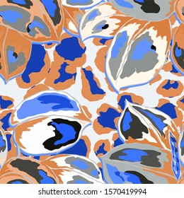 Seamless pattern with tropical leaves on leopard spots. Hand drawn exotic plants. Summer nature jungle print. Can be used for any kind of a surface design. Vector.