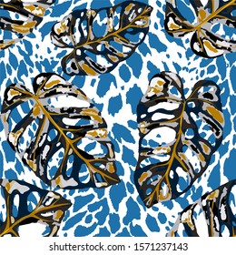 Seamless pattern with tropical leaves on cheetah spots. Hand drawn exotic plants. Summer nature jungle print. Can be used for any kind of a surface design. Vector. 