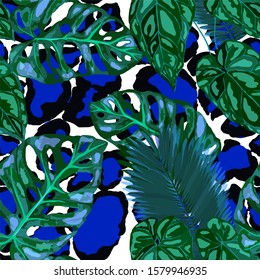 Seamless pattern with tropical leaves on leopard spots. Hand drawn exotic plants. Summer nature jungle print. Can be used for any kind of a surface design. Vector. 