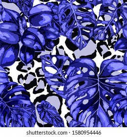 Seamless pattern with tropical leaves on leopard spots. Hand drawn exotic plants. Summer nature jungle print. Can be used for any kind of a surface design. Vector. 