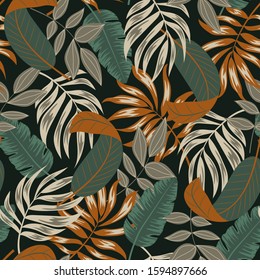 Seamless pattern with tropical leaves on dark background. Trendy summer Hawaii print. Floral pattern. Vector background for various surface. Jungle leaves. Hand draw texture.