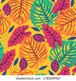 Seamless pattern with tropical leaves on yellow background. Vector graphics.
