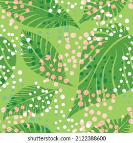 seamless pattern of tropical leaves on dot background