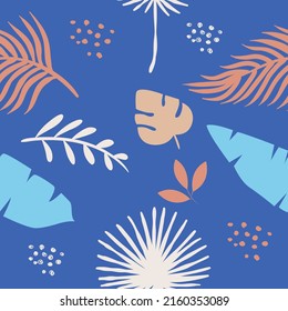 Seamless pattern with tropical leaves on a blue background. Monstera, dandelion, banana leaves, twigs and dots. Modern trendy wallpaper.