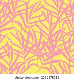 Seamless pattern with tropical leaves on yellow background.