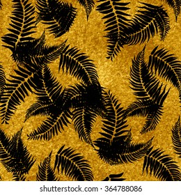 Seamless pattern with tropical leaves on gold background. Hand drawn background